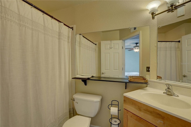 2500 Winding Creek Blvd Unit G307, Clearwater, FL 33761 - full bathroom with toilet, a ceiling fan, and vanity