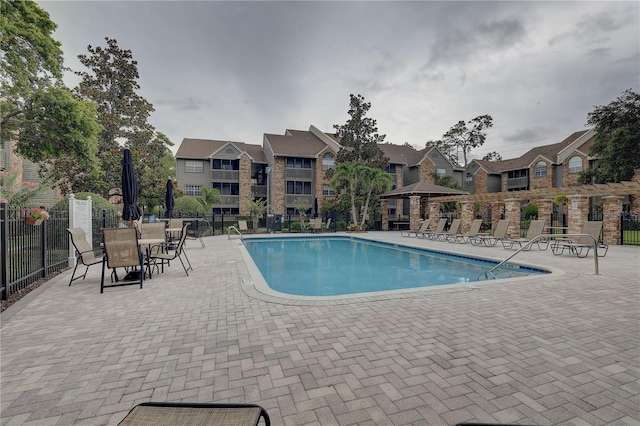2500 Winding Creek Blvd Unit G307, Clearwater, FL 33761 - community pool with a patio and a residential view
