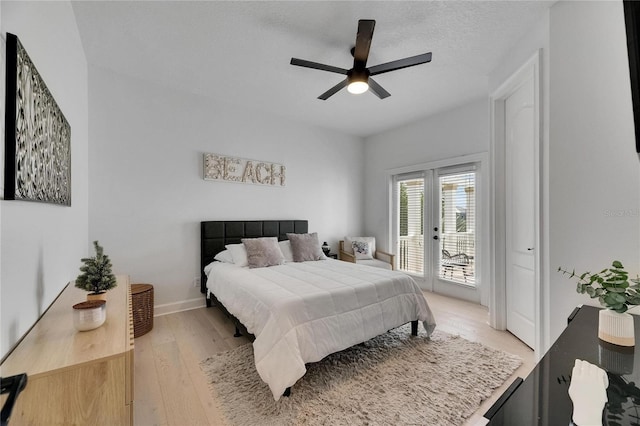 6512 Simone Shores Cir, Apollo Beach, FL 33572 - bedroom with access to outside, light wood finished floors, a ceiling fan, and baseboards