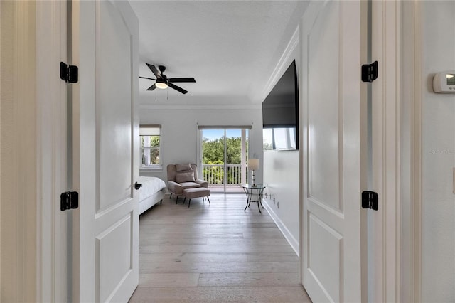 6512 Simone Shores Cir, Apollo Beach, FL 33572 - sitting room featuring ornamental molding, ceiling fan, light wood finished floors, and baseboards