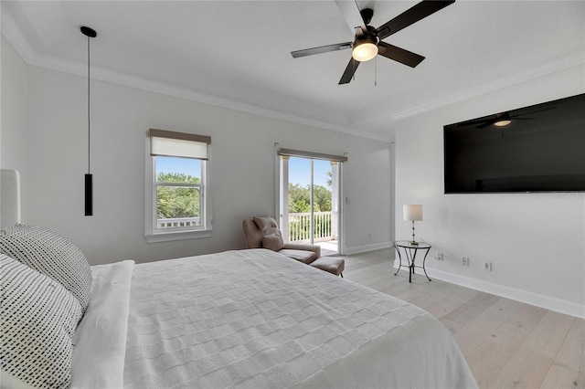 6512 Simone Shores Cir, Apollo Beach, FL 33572 - bedroom featuring ornamental molding, access to exterior, light wood-style floors, baseboards, and ceiling fan