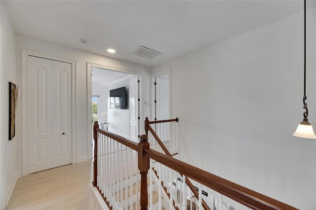 6512 Simone Shores Cir, Apollo Beach, FL 33572 - hall featuring an upstairs landing, light wood-style floors, recessed lighting, and baseboards