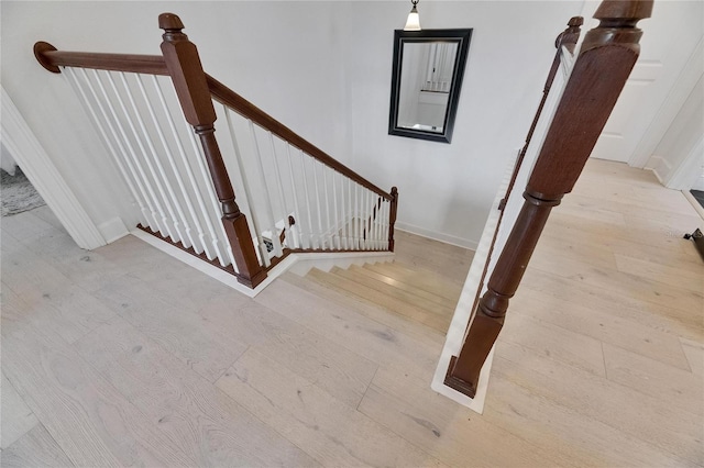6512 Simone Shores Cir, Apollo Beach, FL 33572 - stairway featuring wood finished floors and baseboards