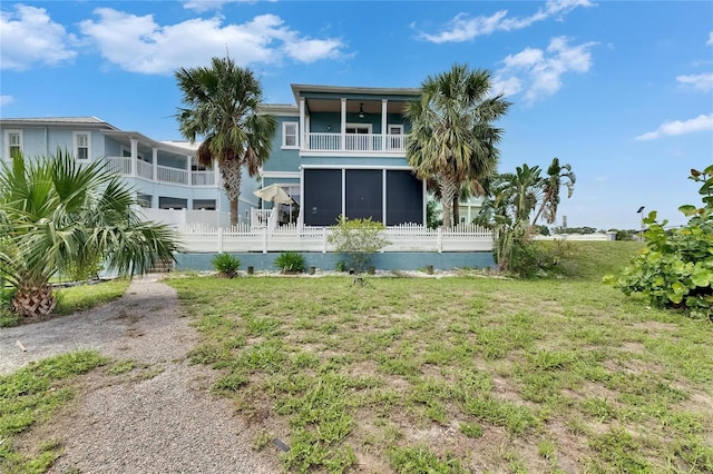 6512 Simone Shores Cir, Apollo Beach, FL 33572 - rear view of property with a balcony and a sunroom