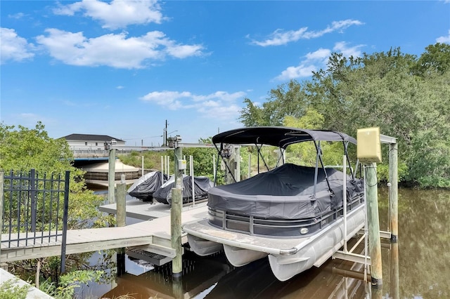 6512 Simone Shores Cir, Apollo Beach, FL 33572 - dock with boat lift and a water view