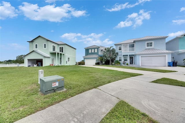 6512 Simone Shores Cir, Apollo Beach, FL 33572 - traditional home with concrete driveway, a garage, a standing seam roof, stucco siding, and a front lawn