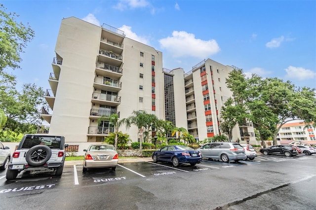 2699 Seville Blvd Unit 207, Clearwater, FL 33764 - view of apartment building / complex featuring uncovered parking