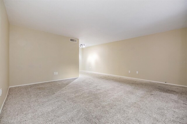 2699 Seville Blvd Unit 207, Clearwater, FL 33764 - empty room with carpet and baseboards