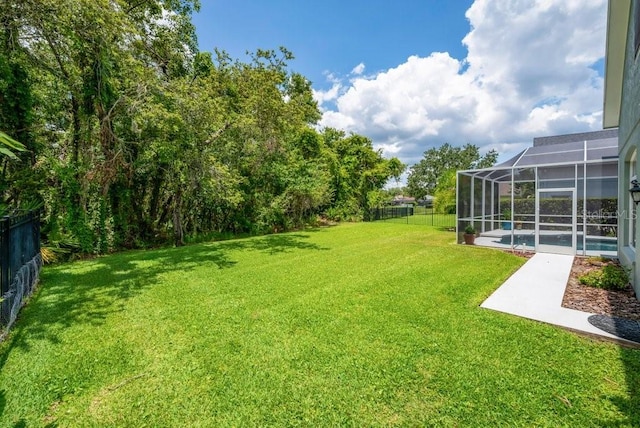 15309 Palomapark Ln, Lithia, FL 33547 - view of yard featuring an outdoor pool and glass enclosure