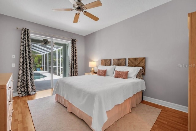 15309 Palomapark Ln, Lithia, FL 33547 - bedroom with access to outside, light wood finished floors, baseboards, and ceiling fan