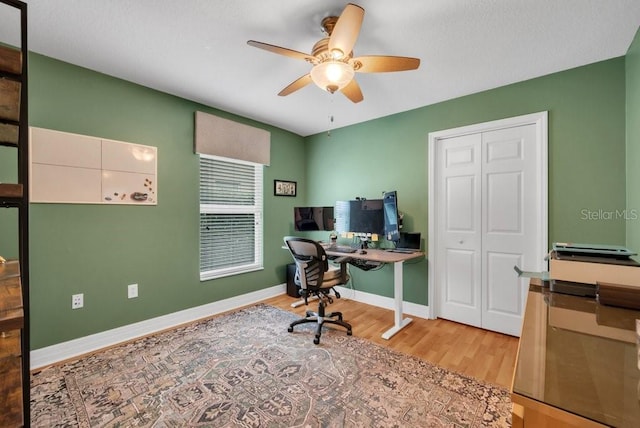 15309 Palomapark Ln, Lithia, FL 33547 - office featuring ceiling fan, wood finished floors, and baseboards