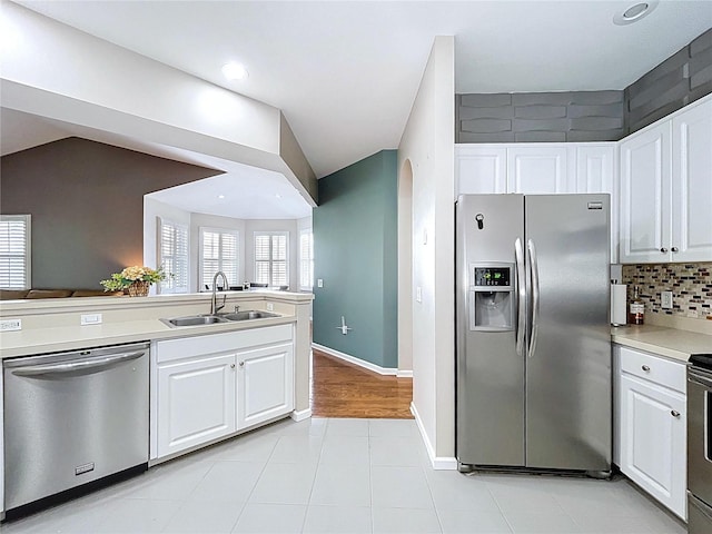 776 Grasslands Village Cir Unit 776, Lakeland, FL 33803 - kitchen featuring stainless steel appliances, white cabinetry, light countertops, and recessed lighting