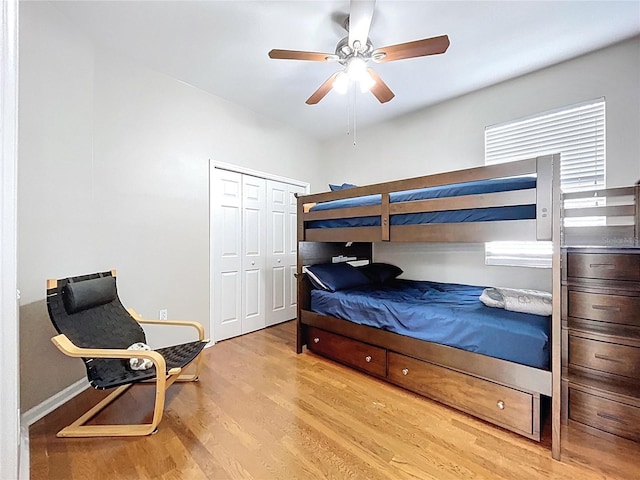 776 Grasslands Village Cir Unit 776, Lakeland, FL 33803 - bedroom featuring wood finished floors, a closet, and ceiling fan