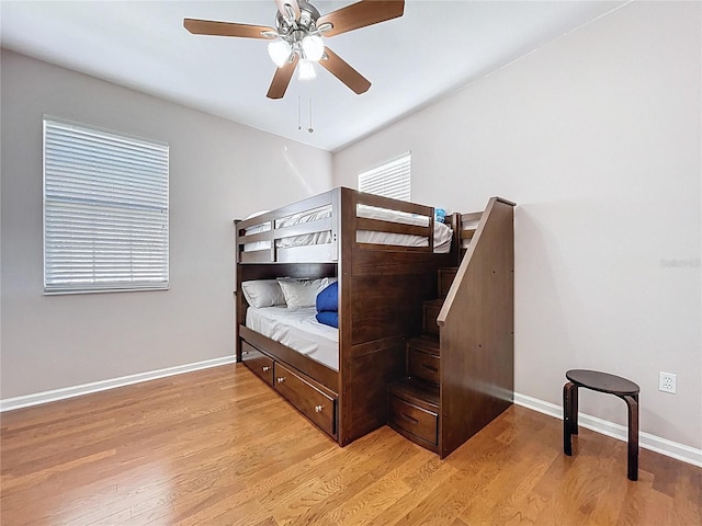 776 Grasslands Village Cir Unit 776, Lakeland, FL 33803 - bedroom with light wood-style floors and ceiling fan