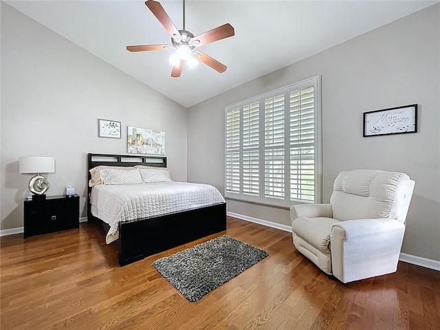 776 Grasslands Village Cir Unit 776, Lakeland, FL 33803 - bedroom with vaulted ceiling, wood finished floors, and ceiling fan