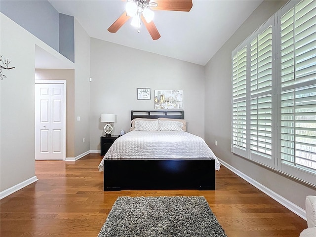 776 Grasslands Village Cir Unit 776, Lakeland, FL 33803 - bedroom with lofted ceiling, wood finished floors, and ceiling fan