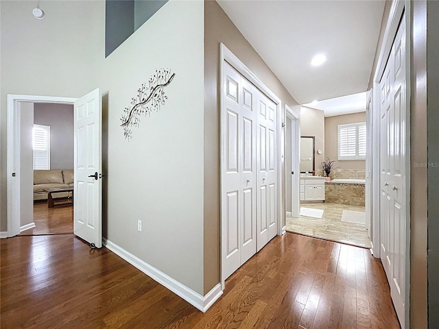 776 Grasslands Village Cir Unit 776, Lakeland, FL 33803 - corridor with wood-type flooring and baseboards