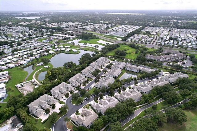 776 Grasslands Village Cir Unit 776, Lakeland, FL 33803 - aerial view of property and surrounding area featuring nearby suburban area and a large body of water