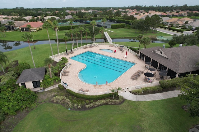 776 Grasslands Village Cir Unit 776, Lakeland, FL 33803 - community pool with a water view, a hot tub, a patio area, and a residential view