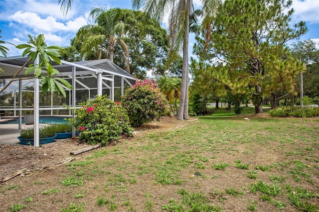 11638 Branch Mooring Dr, Tampa, FL 33635 - view of yard with an outdoor pool and glass enclosure