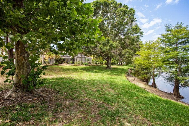 11638 Branch Mooring Dr, Tampa, FL 33635 - view of grassy yard featuring a water view
