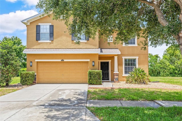 12244 Fairlawn Dr, Riverview, FL 33579 - view of front of property with a garage, stucco siding, concrete driveway, and roof with shingles