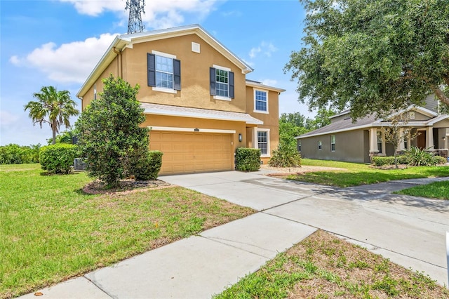 12244 Fairlawn Dr, Riverview, FL 33579 - traditional-style house with stucco siding, an attached garage, driveway, and a front lawn