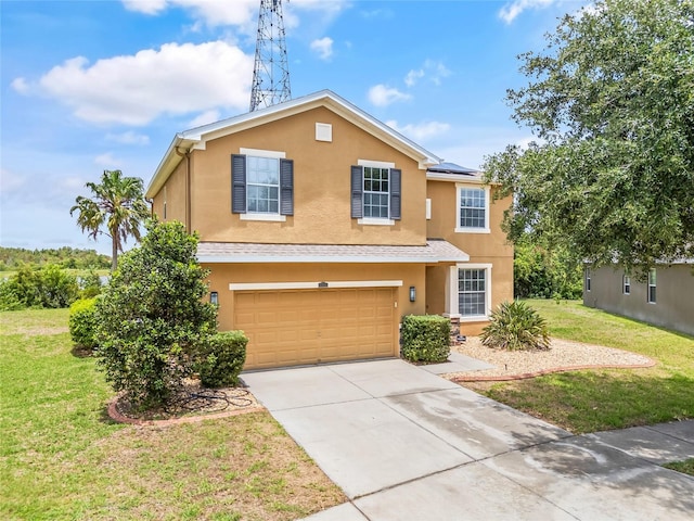 12244 Fairlawn Dr, Riverview, FL 33579 - view of front of property featuring stucco siding, an attached garage, a front lawn, and roof mounted solar panels