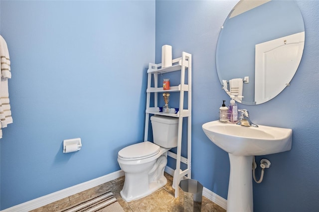 12244 Fairlawn Dr, Riverview, FL 33579 - bathroom with toilet and tile patterned floors