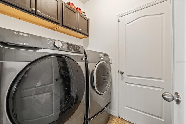 12244 Fairlawn Dr, Riverview, FL 33579 - washroom with independent washer and dryer, cabinet space, and light tile patterned floors