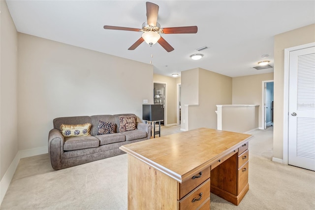 12244 Fairlawn Dr, Riverview, FL 33579 - office area with light carpet and a ceiling fan