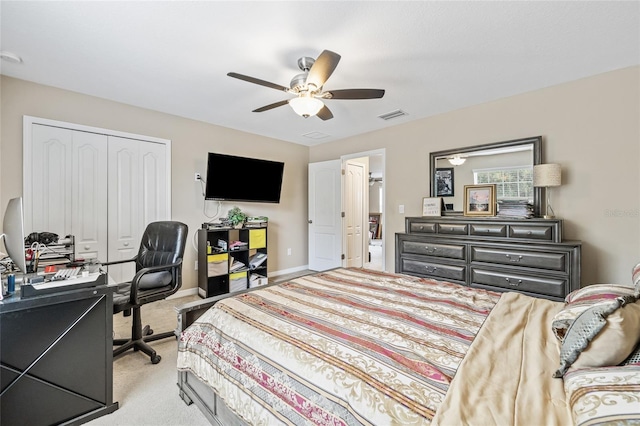 12244 Fairlawn Dr, Riverview, FL 33579 - bedroom featuring light carpet, a closet, a desk, and ceiling fan