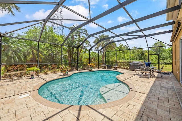 12244 Fairlawn Dr, Riverview, FL 33579 - outdoor pool with grilling area, a patio, and a lanai