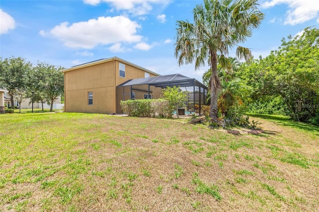 12244 Fairlawn Dr, Riverview, FL 33579 - view of green lawn with a lanai