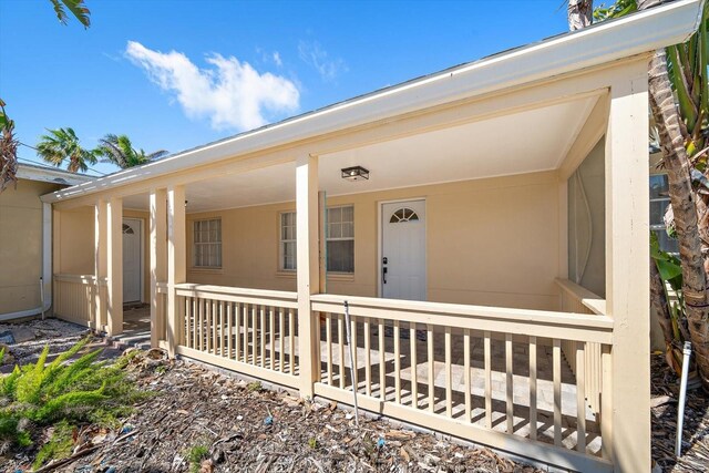 608 Bay Esplanade, Clearwater Beach, FL 33767 - entrance to property featuring a porch