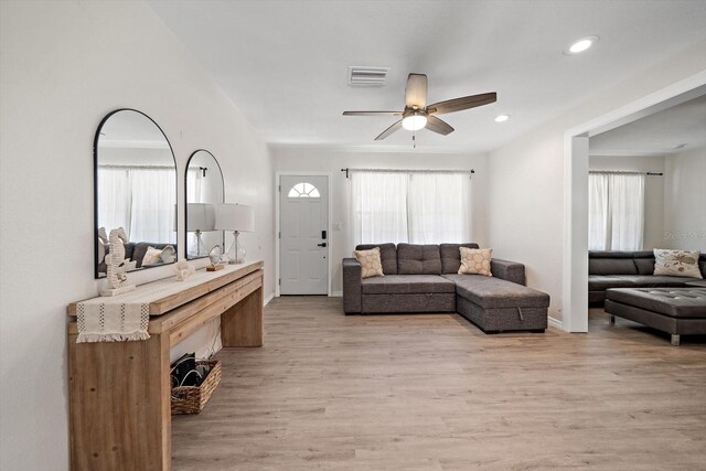 608 Bay Esplanade, Clearwater Beach, FL 33767 - living room with ceiling fan, plenty of natural light, light wood-style floors, and recessed lighting