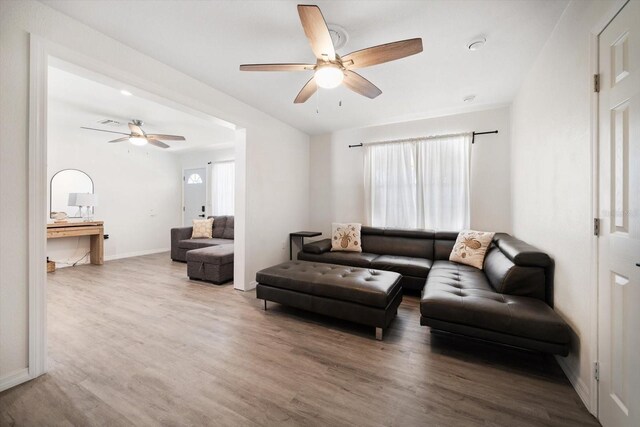 608 Bay Esplanade, Clearwater Beach, FL 33767 - living room featuring ceiling fan and wood finished floors