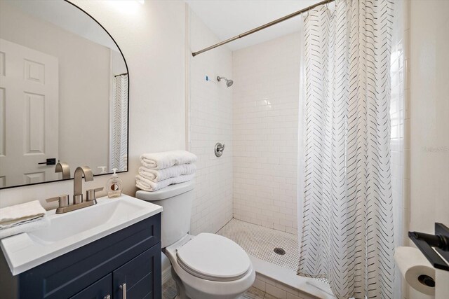 608 Bay Esplanade, Clearwater Beach, FL 33767 - bathroom featuring tiled shower and vanity