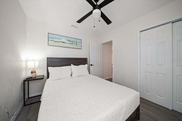 608 Bay Esplanade, Clearwater Beach, FL 33767 - bedroom featuring dark wood finished floors, ceiling fan, and a closet