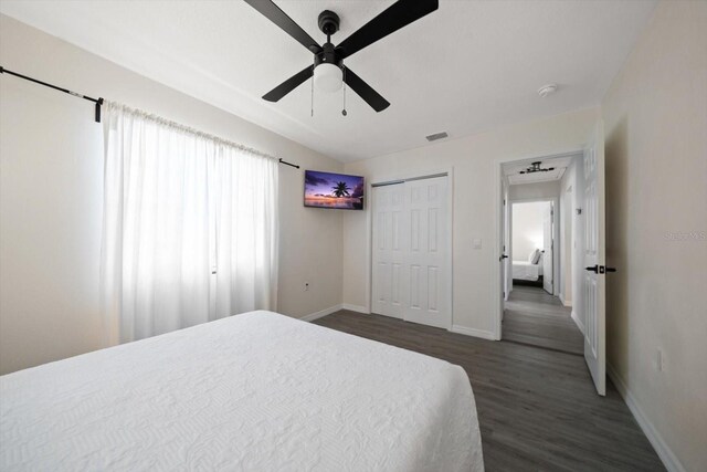 608 Bay Esplanade, Clearwater Beach, FL 33767 - bedroom featuring dark wood-style floors, a closet, ceiling fan, and lofted ceiling
