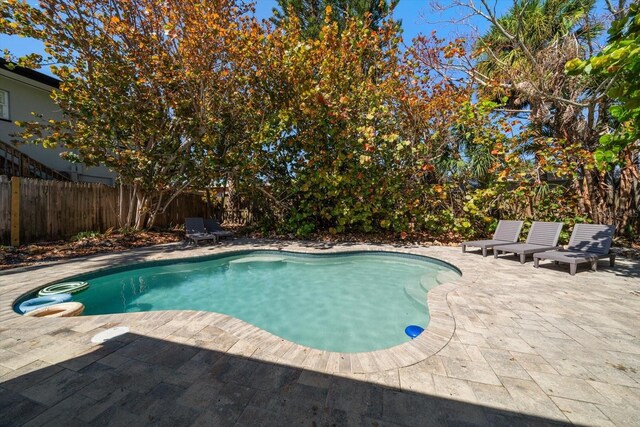 608 Bay Esplanade, Clearwater Beach, FL 33767 - view of swimming pool featuring a patio area