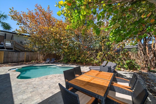 608 Bay Esplanade, Clearwater Beach, FL 33767 - view of pool with a patio, a fenced backyard, and outdoor dining space