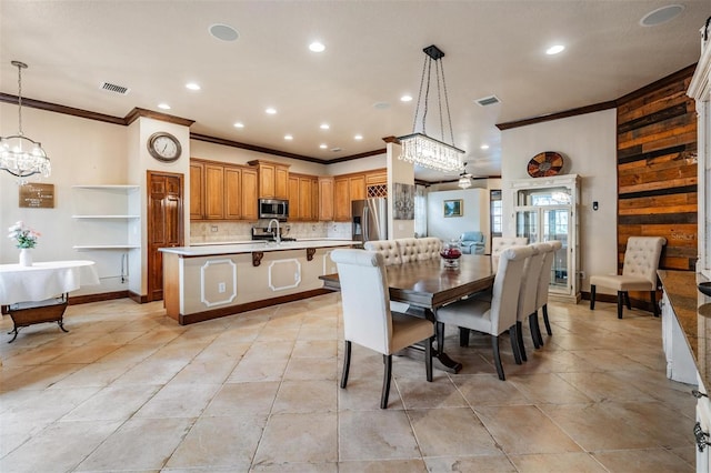 4400 English Turn Way, Wesley Chapel, FL 33543 - dining space featuring ornamental molding, a chandelier, light tile patterned flooring, recessed lighting, and baseboards