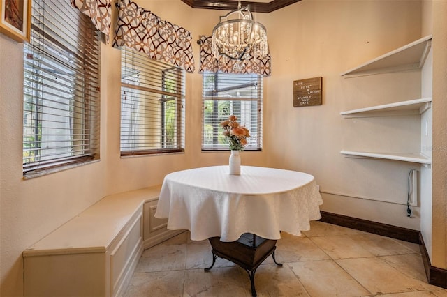 4400 English Turn Way, Wesley Chapel, FL 33543 - dining area featuring a chandelier, healthy amount of natural light, baseboards, breakfast area, and crown molding