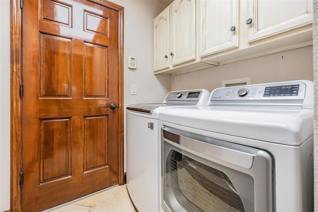 4400 English Turn Way, Wesley Chapel, FL 33543 - laundry area with washing machine and dryer, cabinet space, and light tile patterned floors