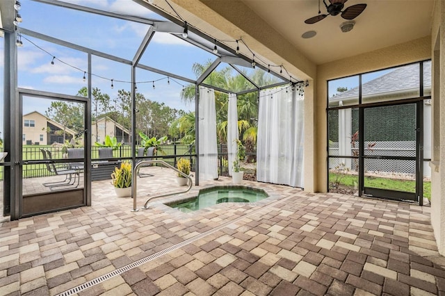 4400 English Turn Way, Wesley Chapel, FL 33543 - unfurnished sunroom featuring a hot tub and ceiling fan