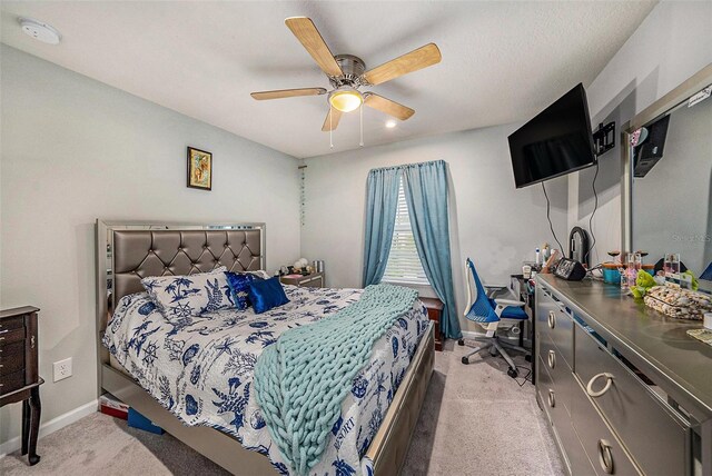 2844 Jacob Crossing Ln, Holiday, FL 34691 - bedroom featuring light colored carpet, baseboards, and ceiling fan