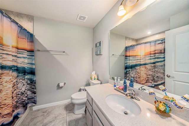 2844 Jacob Crossing Ln, Holiday, FL 34691 - bathroom featuring vanity, toilet, baseboards, tile patterned flooring, and a shower with shower curtain