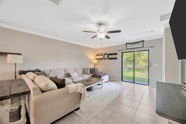 14716 Crescent Rock Dr, Wimauma, FL 33598 - living room with a ceiling fan, ornamental molding, light tile patterned flooring, and baseboards