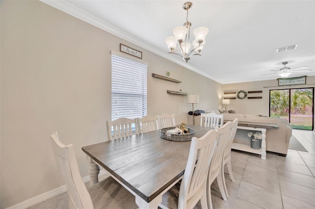 14716 Crescent Rock Dr, Wimauma, FL 33598 - dining space featuring a chandelier, ornamental molding, light tile patterned floors, a ceiling fan, and baseboards